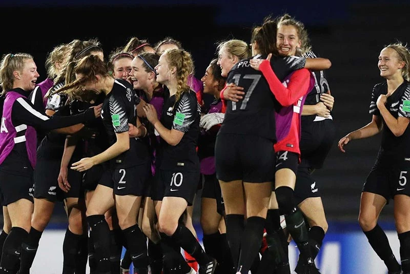 New Zealand women’s football team celebrating victory on field, sports hydration and wellness supported by Pryme.