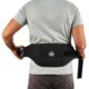 Worker wearing Ergodyne ProFlex 1500 black back support belt showing adjustable lumbar design and ergonomic fit.
