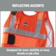 Close-up of Ergodyne orange cooling vest with reflective strips for added safety on work sites.