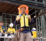 Worker wearing cooling PPE to help prevent heat stress on site.